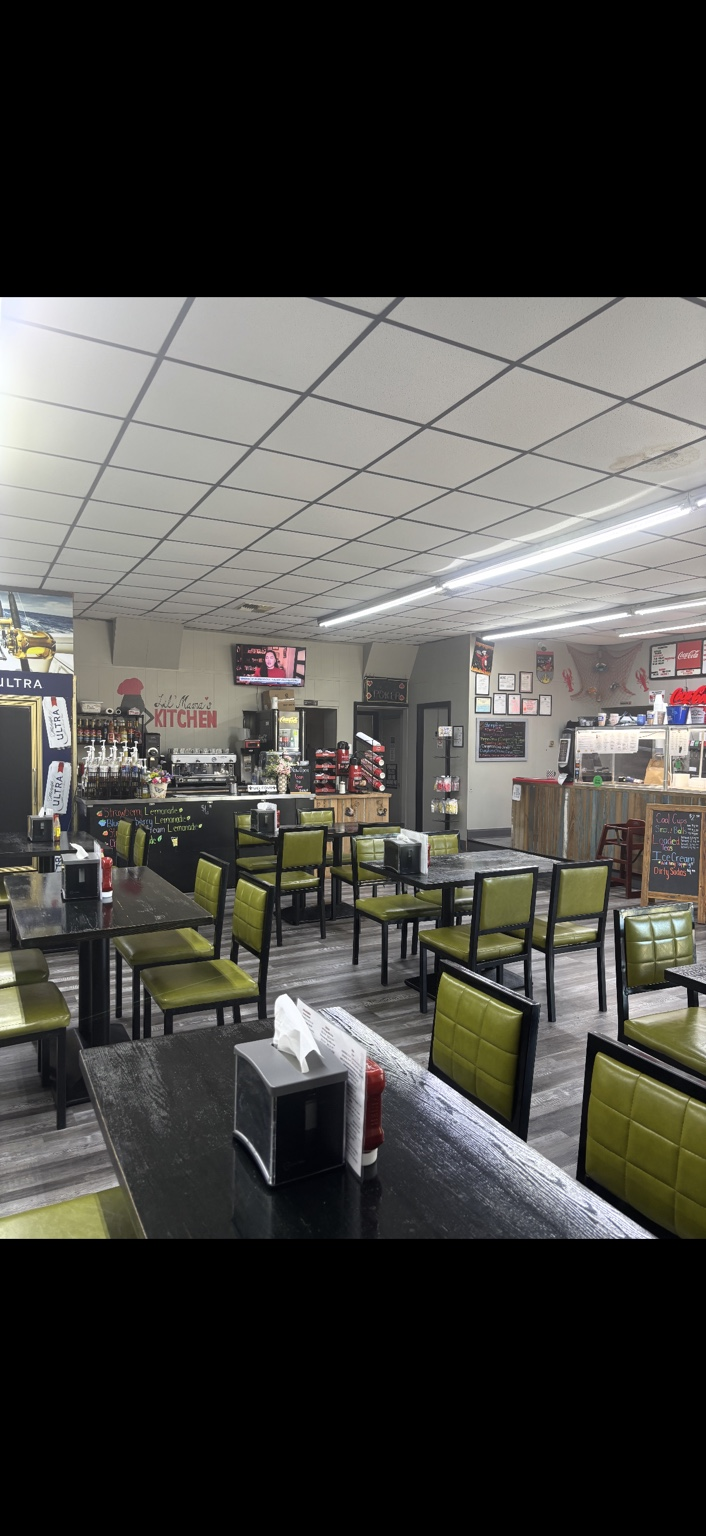 Dining room and service counter inside Lil Mama's Kitchen